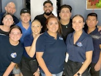 a group of people posing for a photo